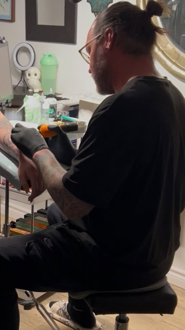 Studio artist at work, warm key light